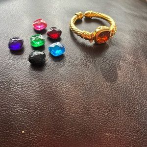 One of Joan Rivers last offerings, a hinged bracelet with 7 different stones.